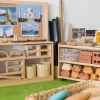 Enriching Environments Construction Area Self-Assembly