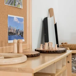 Enriching Environments Construction Area Self-Assembly